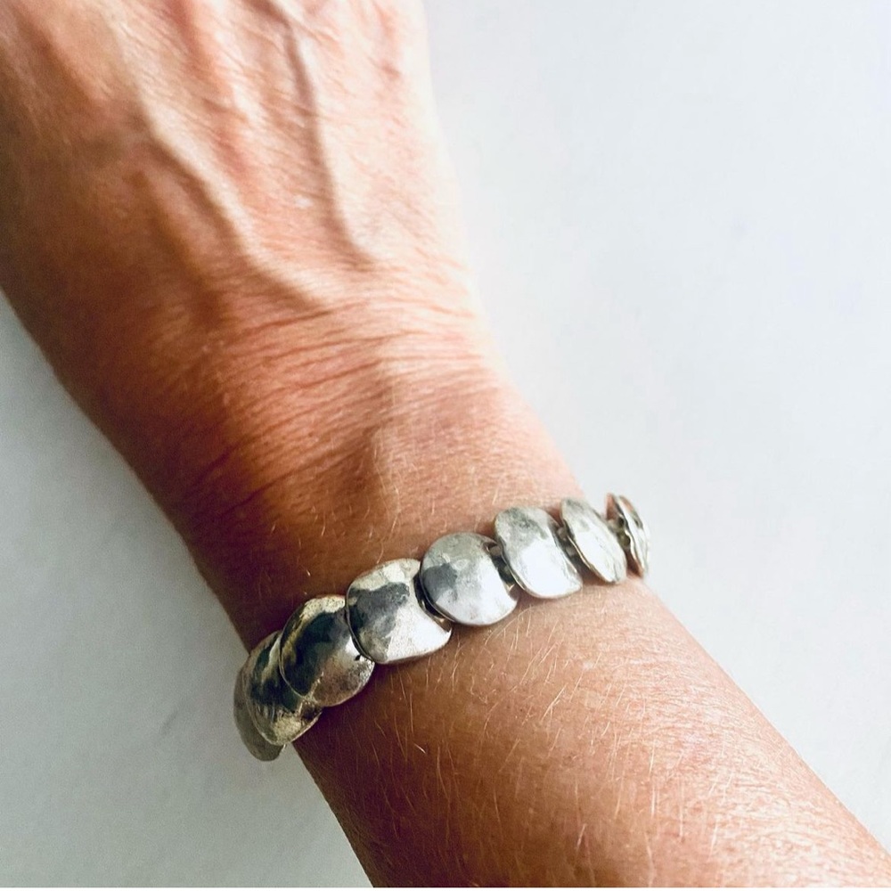 Hammered real Silver disc  bracelet. One size stretch bracelet.